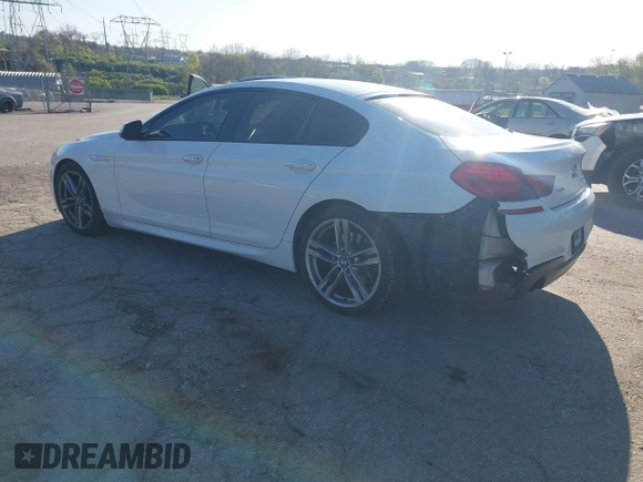 2016 BMW 6 Series 640i xDrive with VIN WBA6D2C51GGT66209, listed as a IAAI auction lot 42064405 with 113,500 mi miles and . Bid and sale history available at carsss.com. Image 3.