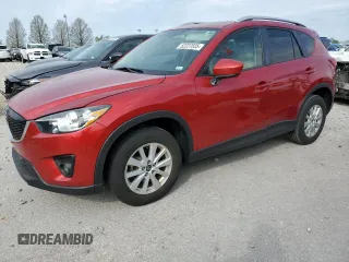 2014 Mazda CX-5 Touring with VIN JM3KE2CY6E0316041, listed as a Copart auction lot 52227835 with 69,921 mi miles and Salvage Title. Bid and sale history available at DreamBid. Image 1.
