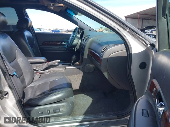 2002 Lincoln LS w/Base Pkg with VIN 1LNHM87A62Y691524, listed as a IAAI auction lot 41670369 with 166,567 mi miles. Bid and sale history available at carsss.com. Image 5.