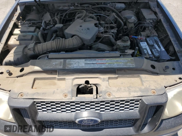 2001 Ford Explorer Sport Trac z VIN 1FMZU77E61UB26259, wystawiony jako Copart lot #62541145 z przebiegiem 258 417 mil mil oraz Czysty tytuł • Clean title. Historia ofert i sprzedaży dostępna na DreamBid. Obrazek 11.