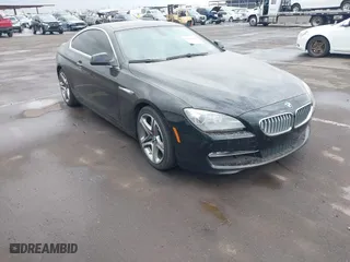 2012 BMW 6 Series 650i with VIN WBALX3C57CDV77359, listed as a IAAI auction lot 41443966 with 64,500 mi miles. Bid and sale history available at carsss.com. Image 1.