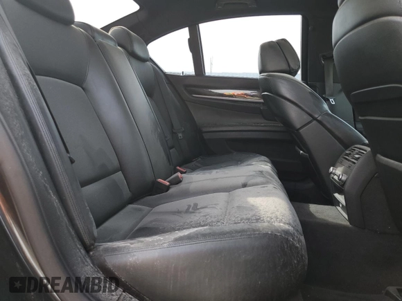 2012 BMW 7 Series 750i with VIN WBAKA8C58CDS99694, listed as a Copart auction lot 46828435 with 131,458 mi miles and Salvage title. Bid and sale history available at DreamBid. Image 10.