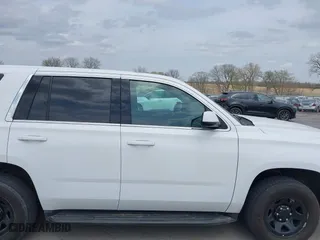 2020 Chevrolet Tahoe Commercial with VIN 1GNSKDEC9LR260983, listed as a IAAI auction lot 42062097 with 124,911 mi miles. Bid and sale history available at carsss.com. Image 13.