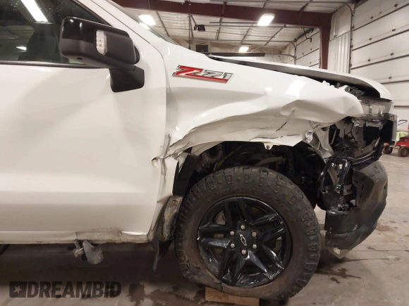 2021 Chevrolet Silverado 1500 LT Trail Boss with VIN 1GCPYFEL2MZ177616, listed as a IAAI auction lot 41941422 with 52,180 mi miles and . Bid and sale history available at DreamBid. Image 6.