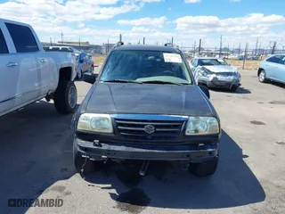 2001 Suzuki Grand Vitara JLX with VIN JS3TD62V414156342, listed as a IAAI auction lot 41762508 with 214,235 mi miles. Bid and sale history available at carsss.com. Image 13.