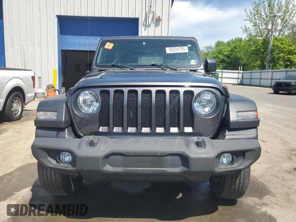 2020 Jeep Wrangler Unlimited Black and Tan with VIN 1C4HJXDGXLW221705, listed as a Copart auction lot 56224785 with 82,360 mi miles and Salvage title. Bid and sale history available at DreamBid. Image 5.