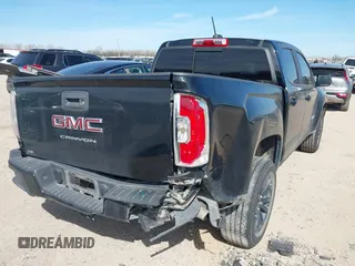 2021 GMC Canyon 2WD Elevation with VIN 1GTG5CEN8M1210433, listed as a IAAI auction lot 41787940 with 77,581 mi miles. Bid and sale history available at carsss.com. Image 6.