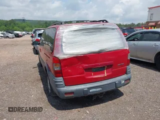1999 Pontiac Montana with VIN 1GMDX03E6XD186081, listed as a IAAI auction lot 42105419 with 249,120 mi miles and . Bid and sale history available at DreamBid. Image 6.