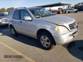 2002 Mercedes-Benz M-Class with VIN 4JGAB54E62A297849, listed as a Copart auction lot 83912114 with 240,479 mi miles and Salvage Title. Bid and sale history available at carsss.com. Image 4.