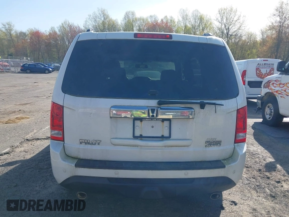 2013 Honda Pilot Touring with VIN 5FNYF4H97DB069979, listed as a IAAI auction lot 42133922 with 276,574 mi miles and . Bid and sale history available at carsss.com. Image 16.