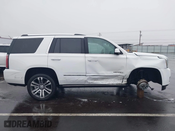 2018 GMC Yukon Denali with VIN 1GKS2CKJ8JR274087, listed as a IAAI auction lot 41097872 with 76,828 mi miles. Bid and sale history available at carsss.com. Image 14.