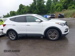 2017 Hyundai Santa Fe 2.4L with VIN 5XYZUDLB0HG397831, listed as a IAAI auction lot 42496341 with 96,333 mi miles and . Bid and sale history available at DreamBid. Image 13.