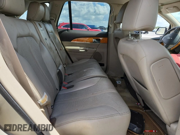 2011 Lincoln MKX z VIN 2LMDJ6JK4BBJ21777, wystawiony jako Copart lot #60412835 z przebiegiem Nie podano mil oraz Szkoda całkowita • Salvage title. Historia ofert i sprzedaży dostępna na DreamBid. Obrazek 10.