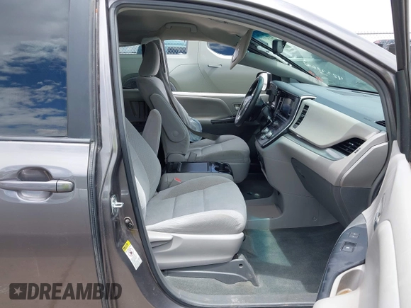 2015 Toyota Sienna LE AAS with VIN 5TDKK3DC8FS531431, listed as a IAAI auction lot 42372601 with 63,633 mi miles and . Bid and sale history available at DreamBid. Image 5.
