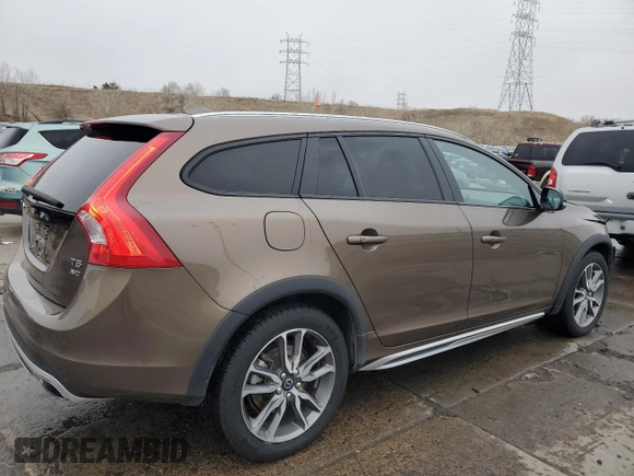 2015 Volvo V60 T5 z VIN YV4612HK7F1000537, wystawiony jako Copart lot #84033744 z przebiegiem 76 563 mil mil oraz Szkoda całkowita • Salvage title. Historia ofert i sprzedaży dostępna na DreamBid. Obrazek 3.