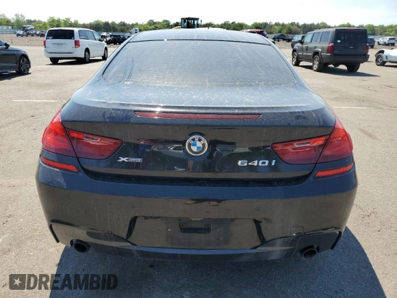 2015 BMW 6 Series z VIN WBALY1C57FDZ73541, wystawiony jako Copart lot #57294034 z przebiegiem 136 357 mil mil oraz Czysty tytuł • Clean title. Historia ofert i sprzedaży dostępna na DreamBid. Obrazek 6.