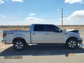 2014 Ford F-150 XL with VIN 1FTFW1CF2EKF90227, listed as a IAAI auction lot 41762047 with 106,927 mi miles. Bid and sale history available at carsss.com. Image 13.