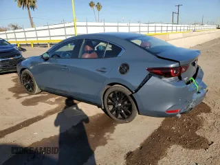 2025 Mazda 3 S Carbon Edition with VIN 3MZBPBCM7SM458520, listed as a Copart auction lot 44171065 with 2,214 mi miles and Clean Title. Bid and sale history available at DreamBid. Image 2.