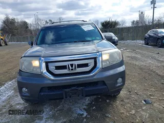 2011 Honda Pilot Touring with VIN 5FNYF4H98BB016012, listed as a IAAI auction lot 41634844 with 202,160 mi miles. Bid and sale history available at carsss.com. Image 12.
