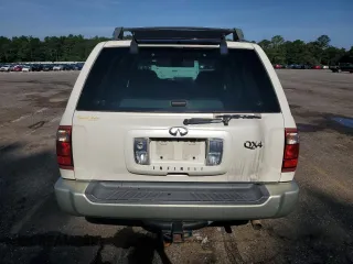 2003 Infiniti QX4 with VIN JNRDR09X33W250292, listed as a Copart auction lot 56020474 with 260,391 mi miles and Clean Title. Bid and sale history available at DreamBid. Image 6.