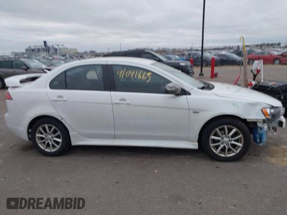 2016 Mitsubishi Lancer SE with VIN JA32V2FWXGU003619, listed as a IAAI auction lot 41041665 with 98,627 mi miles. Bid and sale history available at carsss.com. Image 13.