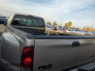 1999 Ford F-350 XL with VIN 1FTWW32F4XED06675, listed as a Copart auction lot 78982514 with 329,060 mi miles and Salvage title. Bid and sale history available at DreamBid. Image 6.