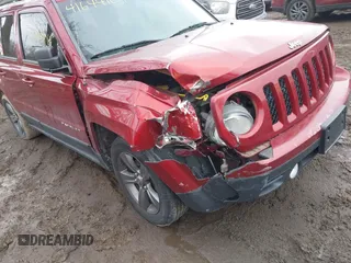 2014 Jeep Patriot Latitude with VIN 1C4NJPFA6ED856768, listed as a IAAI auction lot 41644104 with 133,287 mi miles and . Bid and sale history available at carsss.com. Image 6.