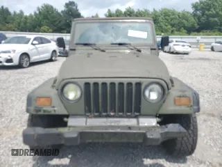 1998 Jeep Wrangler SE with VIN 1J4FY29P8WP784825, listed as a Copart auction lot 61581205 with 148,152 mi miles and Clean title. Bid and sale history available at DreamBid. Image 5.