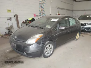 2007 Toyota Prius z VIN JTDKB20UX73266247, wystawiony jako IAAI lot #42149655 z przebiegiem 190 979 mil mil oraz . Historia ofert i sprzedaży dostępna na DreamBid. Obrazek 6.