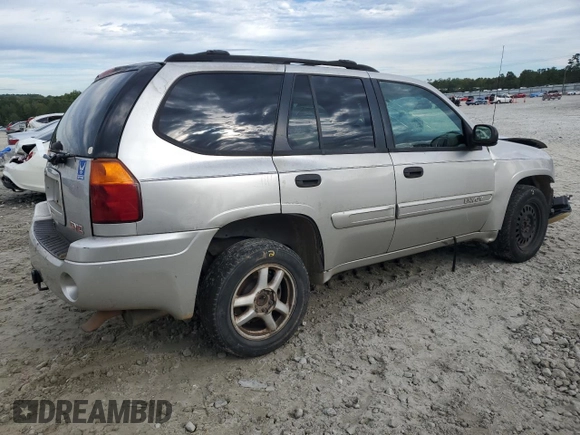 2004 GMC Envoy SLE with VIN 1GKDS13S142309781, listed as a Copart auction lot 73502854 with 349,449 mi miles and Salvage Title. Bid and sale history available at carsss.com. Image 3.