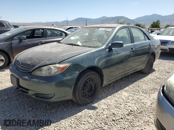 2002 Toyota Camry LE z VIN JTDBE32K120068644, wystawiony jako Copart lot #61168915 z przebiegiem 210 149 mil mil oraz Czysty tytuł • Clean title. Historia ofert i sprzedaży dostępna na DreamBid. Obrazek 1.
