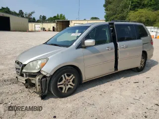 2006 Honda Odyssey EX-L z VIN 5FNRL38706B037805, wystawiony jako Copart lot #57390365 z przebiegiem 219 554 mil mil oraz Szkoda całkowita • Salvage title. Historia ofert i sprzedaży dostępna na DreamBid. Obrazek 1.