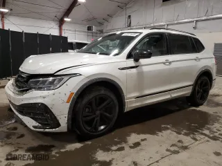 2023 Volkswagen Tiguan SE R-Line Black with VIN 3VV8B7AX4PM135217, listed as a Copart auction lot 47221635 with 19,676 mi miles and Salvage Title. Bid and sale history available at carsss.com. Image 1.