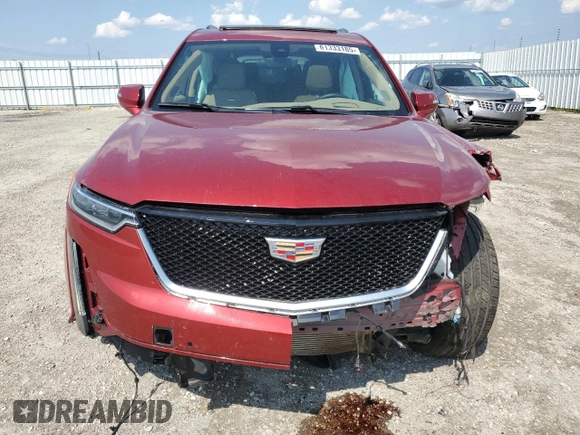2024 Cadillac XT6 AWD Sport z VIN 1GYKPHRS0RZ724524, wystawiony jako Copart lot #61333185 z przebiegiem 12 799 mil mil oraz Nie do naprawy • Non repairable. Historia ofert i sprzedaży dostępna na DreamBid. Obrazek 5.