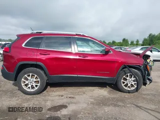 2015 Jeep Cherokee Latitude z VIN 1C4PJMCS0FW534959, wystawiony jako IAAI lot #42657381 z przebiegiem 114 577 mil mil oraz . Historia ofert i sprzedaży dostępna na DreamBid. Obrazek 14.