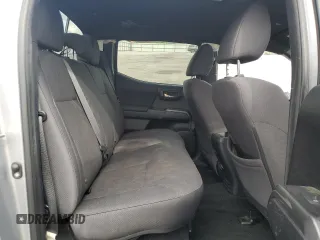 2019 Toyota Tacoma SR with VIN 3TMCZ5AN2KM193701, listed as a Copart auction lot 56776385 with 112,990 mi miles and Salvage title. Bid and sale history available at DreamBid. Image 10.