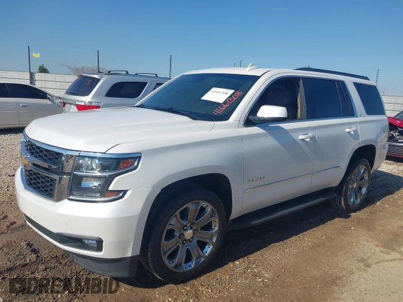 2020 Chevrolet Tahoe LT with VIN 1GNSCBKC9LR196546, listed as a IAAI auction lot 41661308 with 132,714 mi miles and . Bid and sale history available at DreamBid. Image 2.