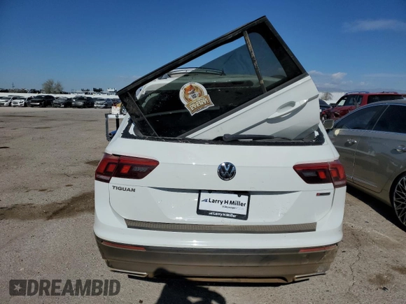 2020 Volkswagen Tiguan S z VIN 3VV0B7AX4LM020785, wystawiony jako Copart lot #87152244 z przebiegiem Nie podano mil oraz Szkoda całkowita • Salvage title. Historia ofert i sprzedaży dostępna na DreamBid. Obrazek 6.