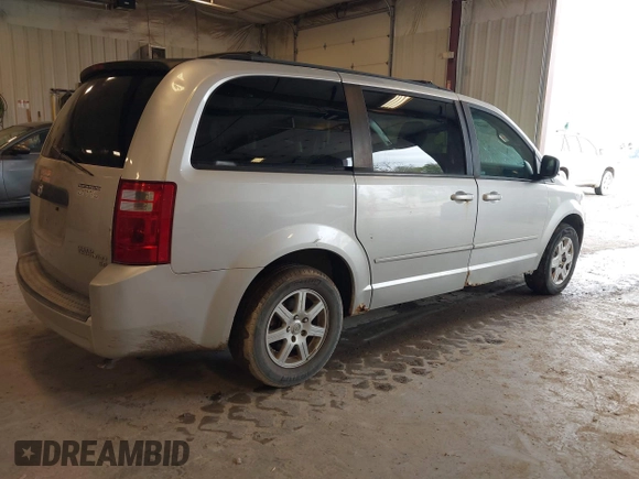 2010 Dodge Grand Caravan SE with VIN 2D4RN4DE8AR173359, listed as a IAAI auction lot 42170689 with 246,553 mi miles and . Bid and sale history available at DreamBid. Image 4.