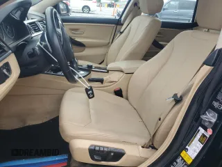 2015 BMW 4 Series 428i xDrive with VIN WBA4C9C57FD330687, listed as a Copart auction lot 67639034 with 114,779 mi miles and Salvage title. Bid and sale history available at DreamBid. Image 7.