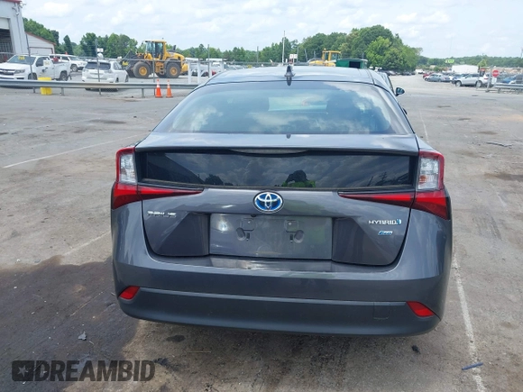 2021 Toyota Prius L Eco z VIN JTDKAMFU3M3152785, wystawiony jako IAAI lot #42501351 z przebiegiem 60 489 mil mil oraz . Historia ofert i sprzedaży dostępna na DreamBid. Obrazek 16.