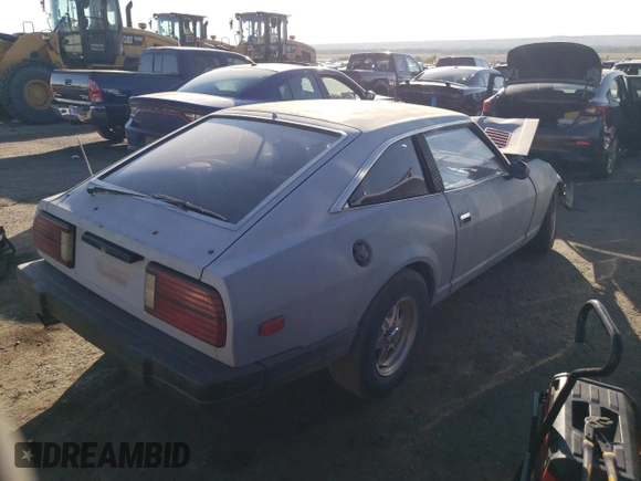1983 Datsun 280ZX 2+2 z VIN JN1HZ06S2DX506351, wystawiony jako Copart lot #74302484 z przebiegiem 17 211 mil mil oraz Szkody całkowita. Historia ofert i sprzedaży dostępna na DreamBid. Obrazek 3.