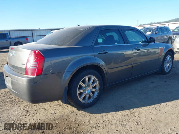 2008 Chrysler 300 LX with VIN 2C3KA43RX8H172037, listed as a IAAI auction lot 41429004 with 194,201 mi miles. Bid and sale history available at carsss.com. Image 4.