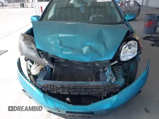 2013 Honda Fit Sport z VIN JHMGE8H54DC026019, wystawiony jako IAAI lot #42125500 z przebiegiem 139 285 mil mil oraz . Historia ofert i sprzedaży dostępna na DreamBid. Obrazek 12.
