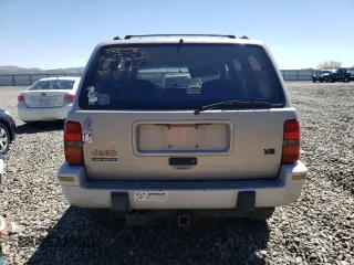 1994 Jeep Grand Cherokee Limited with VIN 1J4GZ78Y0RC190766, listed as a Copart auction lot 54628055 with 217,270 mi miles and Salvage title. Bid and sale history available at DreamBid. Image 6.