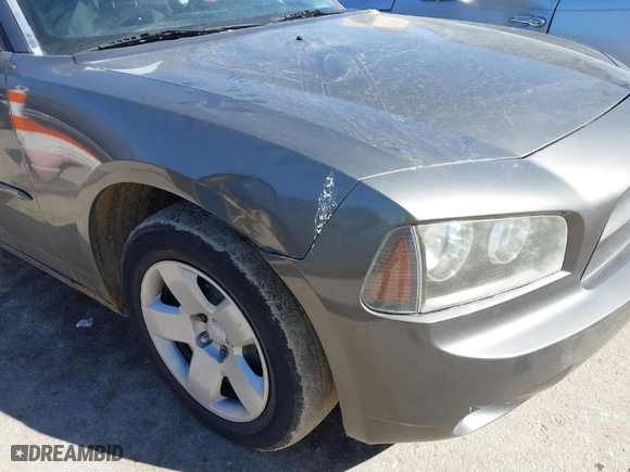 2008 Dodge Charger with VIN 2B3KA43R28H105073, listed as a IAAI auction lot 41670717 with 228,063 mi miles. Bid and sale history available at carsss.com. Image 6.