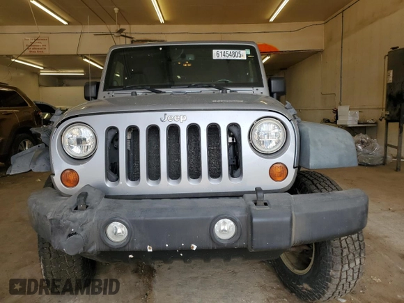 2013 Jeep Wrangler Sport with VIN 1C4GJWAG4DL559422, listed as a Copart auction lot 61454805 with 132,509 mi miles and Salvage title. Bid and sale history available at DreamBid. Image 5.