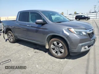 2019 Honda Ridgeline RTL-E with VIN 5FPYK3F73KB016675, listed as a Copart auction lot 55340905 with 69,571 mi miles and Salvage title. Bid and sale history available at DreamBid. Image 4.