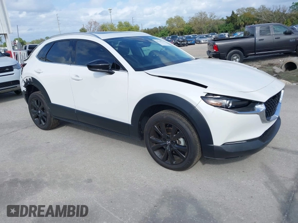 2022 Mazda CX-30 2.5 Turbo Premium Package with VIN 3MVDMBDY3NM437897, listed as a IAAI auction lot 41715776 with 42,771 mi miles. Bid and sale history available at carsss.com. Image 1.