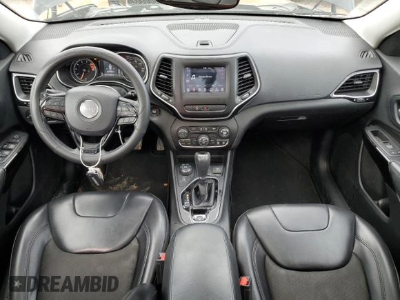 2019 Jeep Cherokee Altitude with VIN 1C4PJMLX9KD451502, listed as a Copart auction lot 50975105 with 117,125 mi miles and Salvage Title. Bid and sale history available at DreamBid. Image 8.